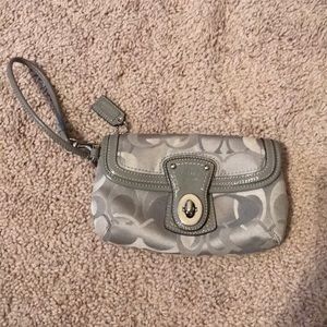 Coach gray wristlet.